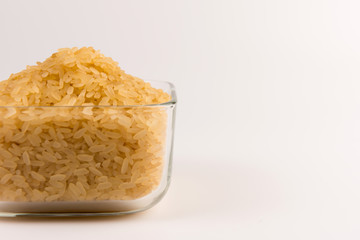 white rice in bowl isolated on white background