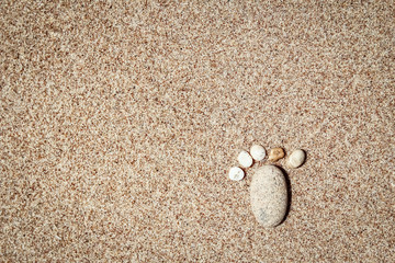 Beautiful footprints in the sand sea nature background