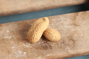peanuts on wooden background