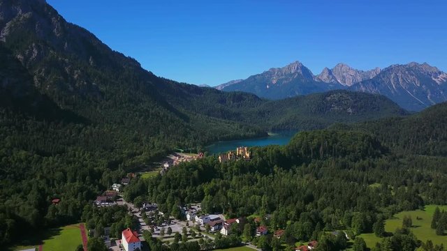 Aerial view of Hohenschwangau Castle and Lake Alpsee near Schwangau, Allgau, Swabia, Bavaria, Germany, Europe