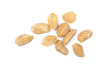 Salted and marinated peanuts, pile isolated on white background, top view