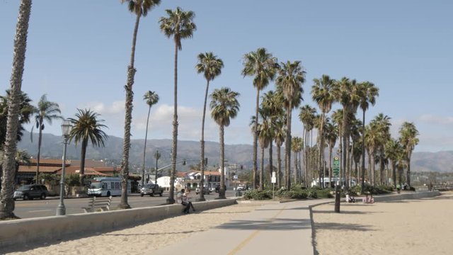 Walkers and cyclists on coastal path next to West Cabrillo Boulevard, Santa Barbara, California, United States of America, North America