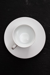 Obraz na płótnie Canvas white cup on ceramic background