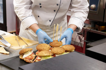 Closeup of a hamburger cooking process.