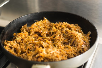 Stewed cabbage in a frying pan
