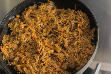 Stewed cabbage in a frying pan