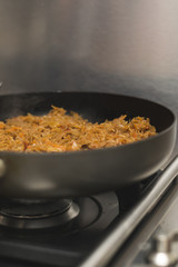 Stewed cabbage in a frying pan