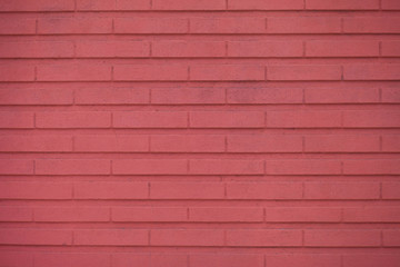 Pink brick wall background. Red wall texture