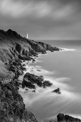 Start Point in Devon. Black and white slow exposure photograph.