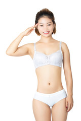 Fototapeta premium Chinese woman posing in panties and bra on white background
