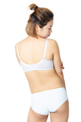 Obraz premium Chinese woman posing in panties and bra on white background