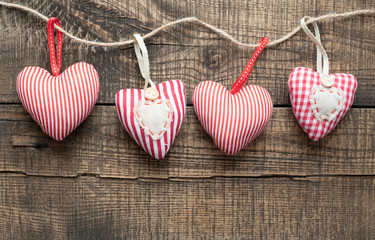 Hearts on wooden background.Valentines day greeting card.Top view with copy space