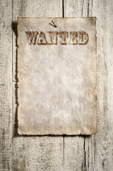 old grunge paper advert on aged wall
