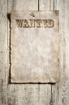 old grunge paper advert on aged wall