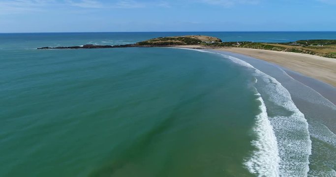 New Zealand aerial drone footage of beach coast nature landscape at Te Waewae Bay by Orepuki in the Southland region of the south island of New Zealand.