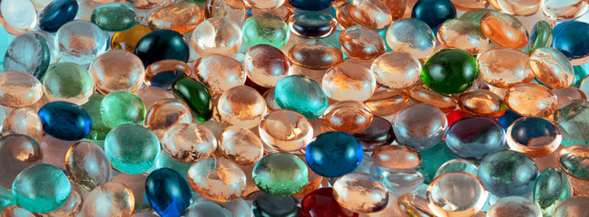 Multicolored glass stones. Panorama.