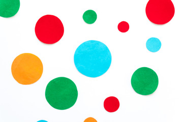 cut out different colored circles on white background