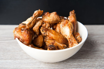 fried chiken wings on the white plate