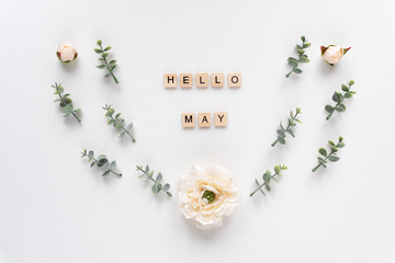 Hello May words on white marble background. © SianStock