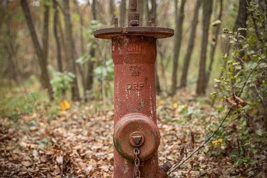 Old German Fire Hydrant Of The Third Reich Times On The Autumn Background