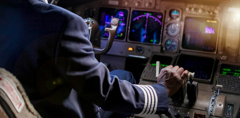 Over the Shoulder of an African Pilot in a Jumbo Cockpit © Sunshine Seeds