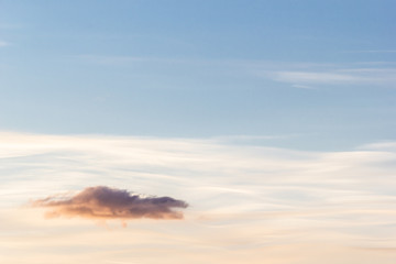 Obraz premium Sky with cumulus clouds at sunset or dawn. Clouds as background