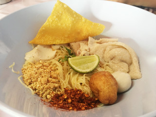 Close uo Thai spicy noodle with fish balls. Thai Food