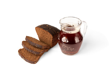 Kvass with rye bread isolated on white background.