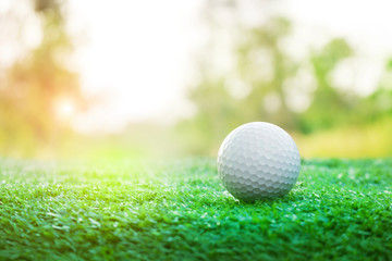 Golf balls on green lawns in beautiful golf courses