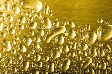 Drops of water on a color background. Gray. Shallow depth of field. Selective focus. Blur.