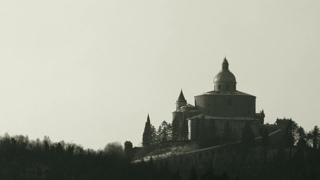 historical black and white San Luca Sanctuary in Bologna city. Historical church and pilgrimage destination in Emilia-Romagna, Italy.
