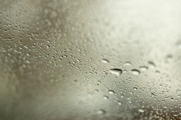 Selective focus and degradation of a background.Abstract texture background and drops of a rain on glass