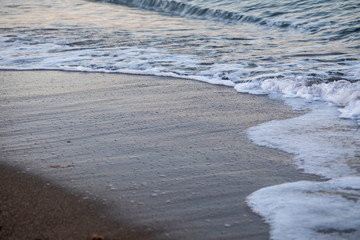 Wave on Clear Sand Beach