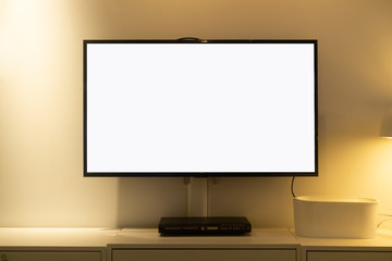 Living room led blank screen tv on concrete wall with wooden table and media player. Mockup blank screen TV for copy space.
