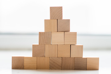 Colorful stack of wood cube building blocks 