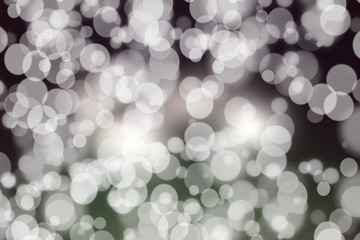 Abstract bokeh festive background with defocused lights