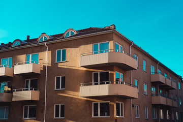 Obraz premium A apartment house. Corner of an apartment in the cold blue light of the sky.