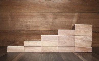 Wooden blocks on wooden table.