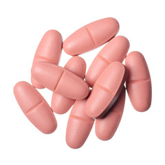 Capsule pills medicine pharmacy pink on white background isolation, top view