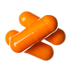 Capsule pills medicine pharmacy orange on white background isolation, top view