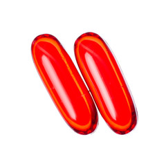 Capsule pills medicine pharmacy red on white background isolation, top view