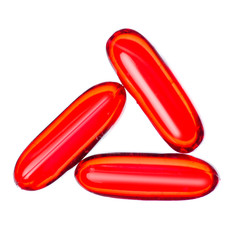 Capsule pills medicine pharmacy red on white background isolation, top view