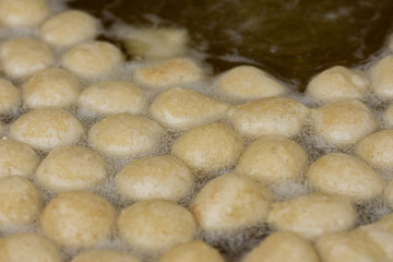 Greek donuts in oil ,Traditional turkish pastry: Lokma
