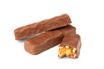 Chocolate bar with caramel and peanut isolated on white background. 