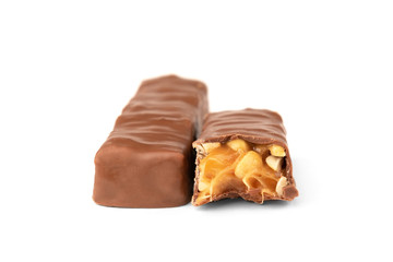 Chocolate bar with caramel and peanut isolated on white background. 