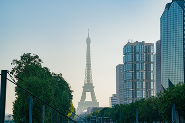Morning view of the Champ de Mars - Tour Eiffel metro station with the famous Eiffel Tower