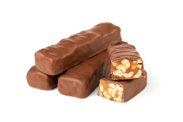 Chocolate bar with caramel and peanut isolated on white background. 