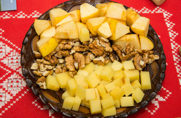 Homemade Autumn salad with cheese, apples, nuts