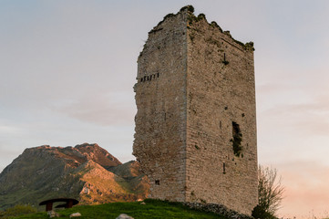 Popular tourist attraction site: Ruins of a medieval tower castle of XII century. Asturias. Spain.