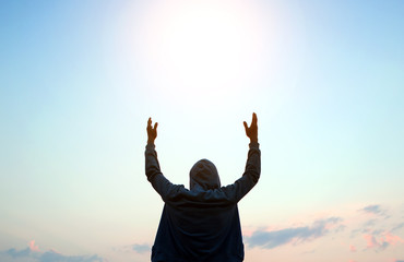 Man Silhouette with Hands Up